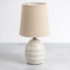 Kirkland's Home Glazed Ivory Stride Mini Table Lamp- Table Lamps