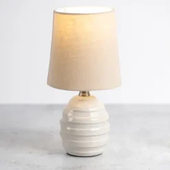 Kirkland's Home Glazed Ivory Stride Mini Table Lamp- Table Lamps