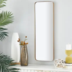 Kirkland's Home Gold Thin Iron Frame Curved Corner Mirror- Decorative Mirrors