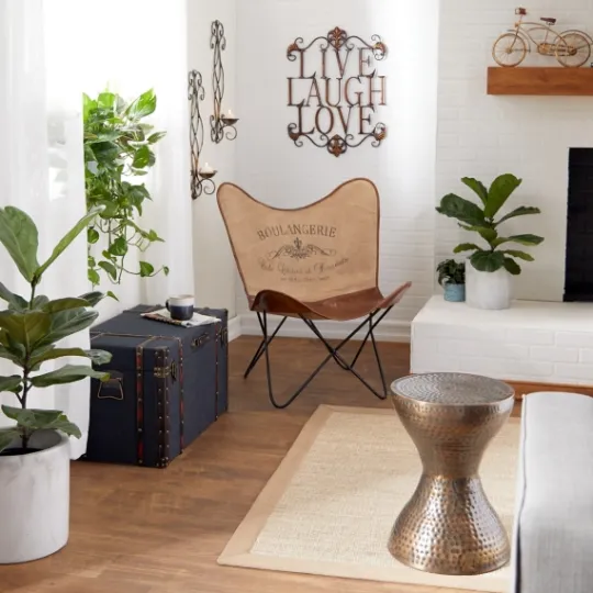 Kirkland's Home Hammered Bronze Iron Hourglass Accent Table- Accent & End Tables