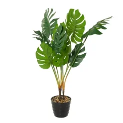Kirkland's Home Monstera Plant In Ribbed Rock Planter- Trees & Topiaries