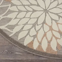 Kirkland's Home Neutral Floral Burst Outdoor Round Area Rug, 7 Ft.- Outdoor Rugs