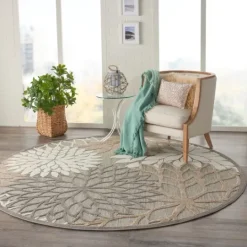 Kirkland's Home Neutral Floral Burst Outdoor Round Area Rug, 7 Ft.- Outdoor Rugs