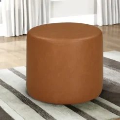 Kirkland's Home Newton Carmel Faux Leather Cylinder Ottoman- Benches & Ottomans
