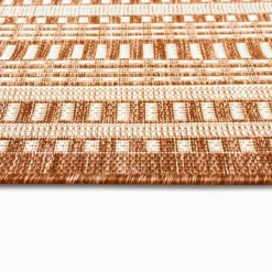Kirkland's Home Rust Linear Macy Indoor/Outdoor Area Rug, 7X9- Outdoor Rugs